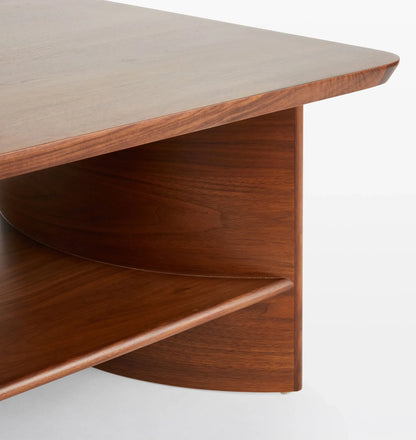 Contemporary Curved Coffee Table with rich wood finish and lower shelf
