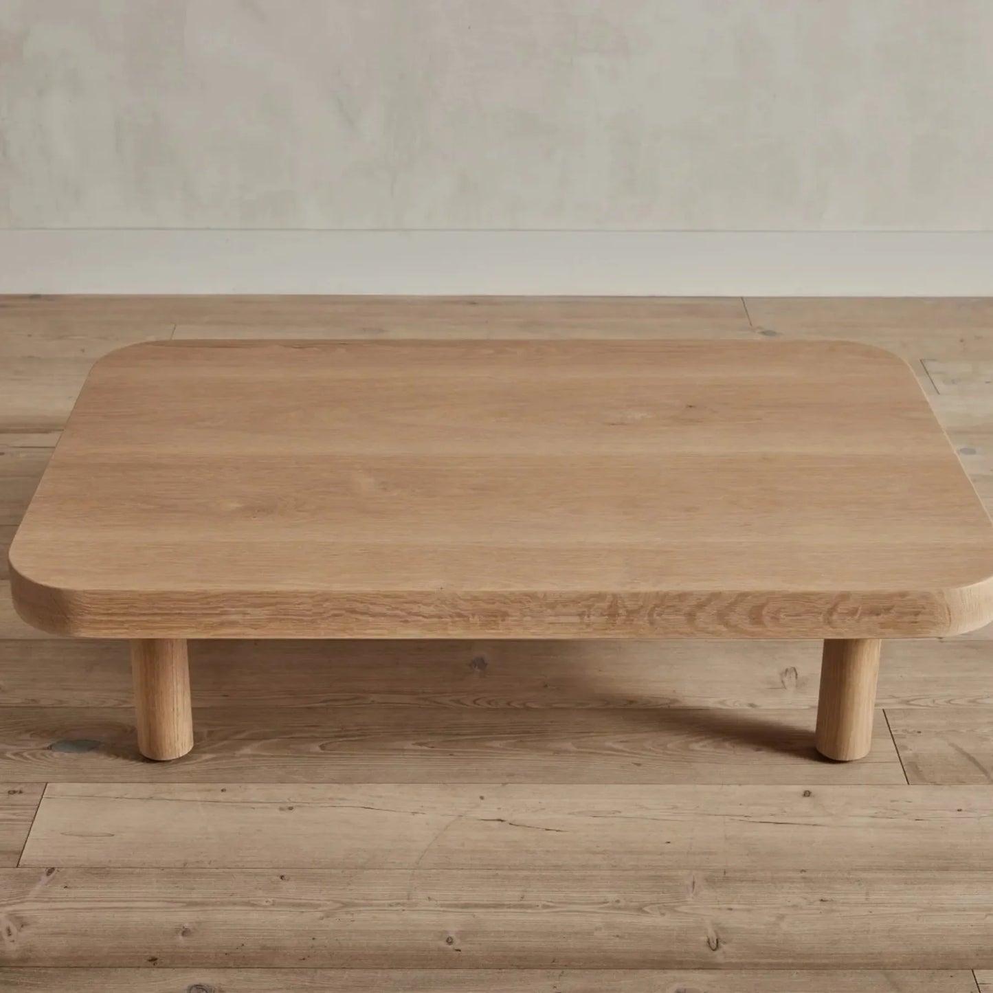 Contemporary Low Profile Coffee Table with rounded edges and sturdy cylindrical legs