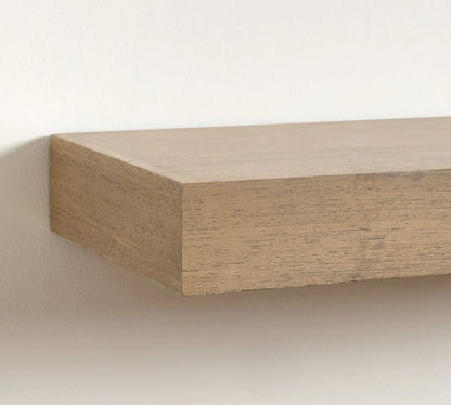 Contemporary wall mounted shelf styled with plants and decor items