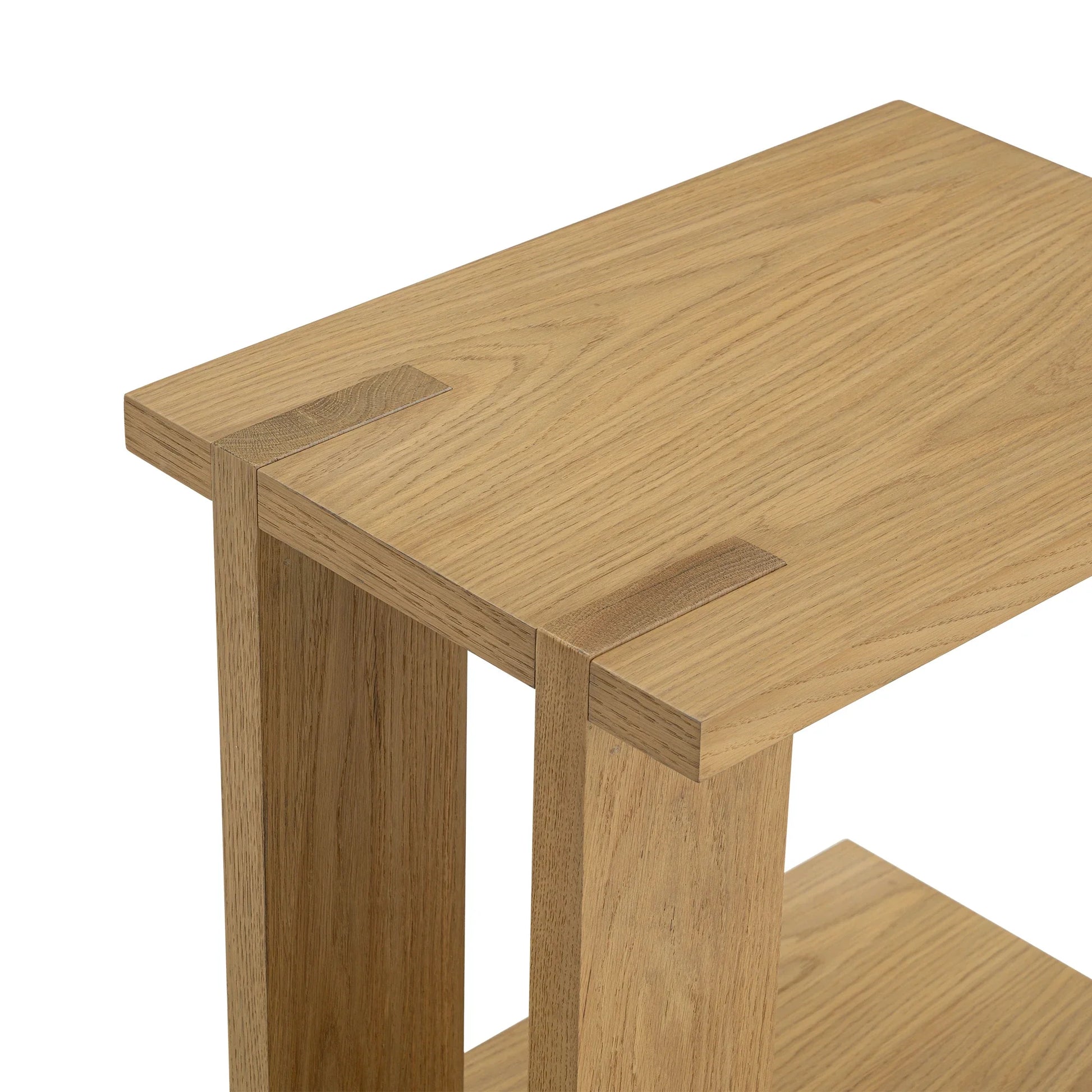 Elegant C shaped side table with open base and compact design perfect for small spaces