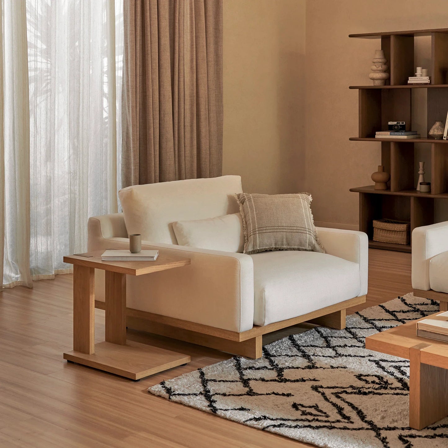 Elegant C shaped side table with open base and compact design perfect for small spaces