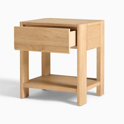 Elegant bedroom nightstand storage, featuring a drawer and open shelf