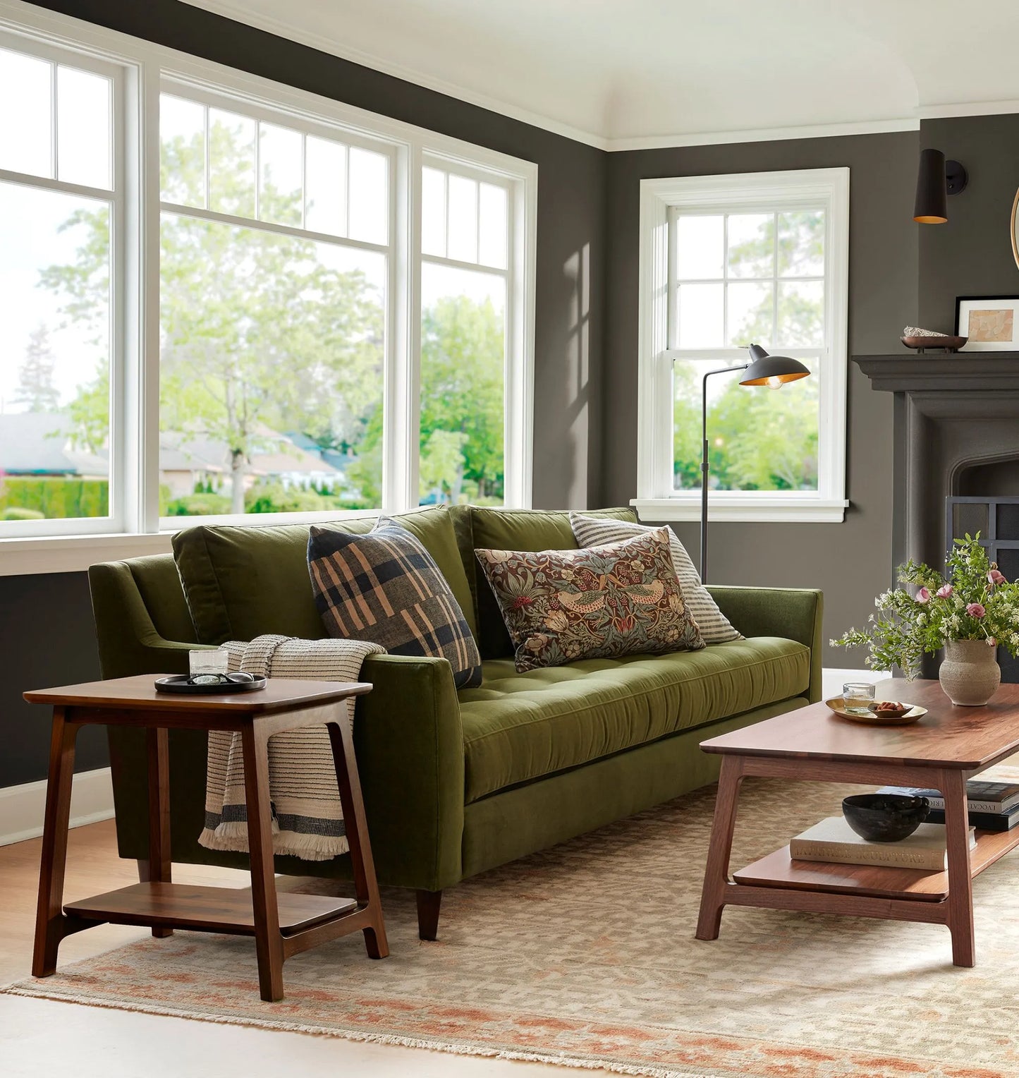 Elegant compact wooden side table with open lower shelf in a cozy room