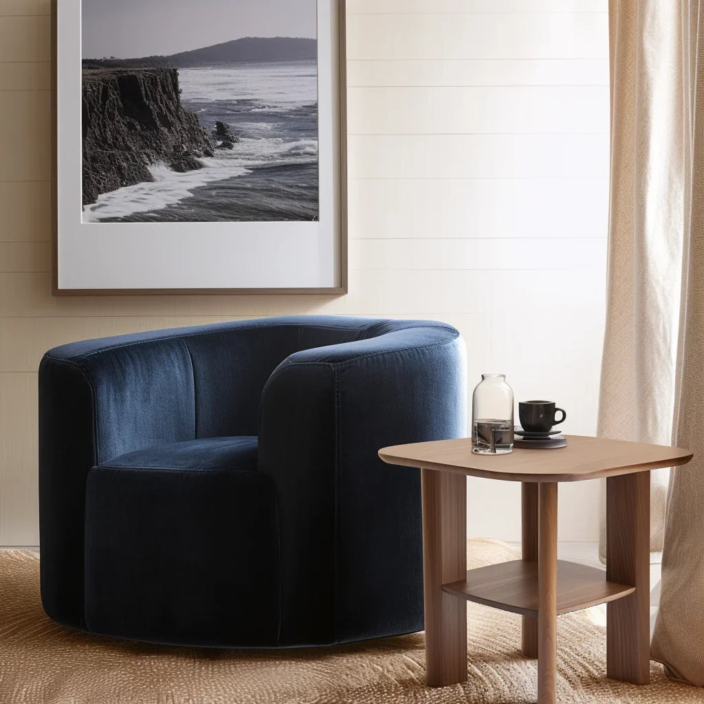 Everyday side table with square top and lower shelf styled in a cozy modern reading corner