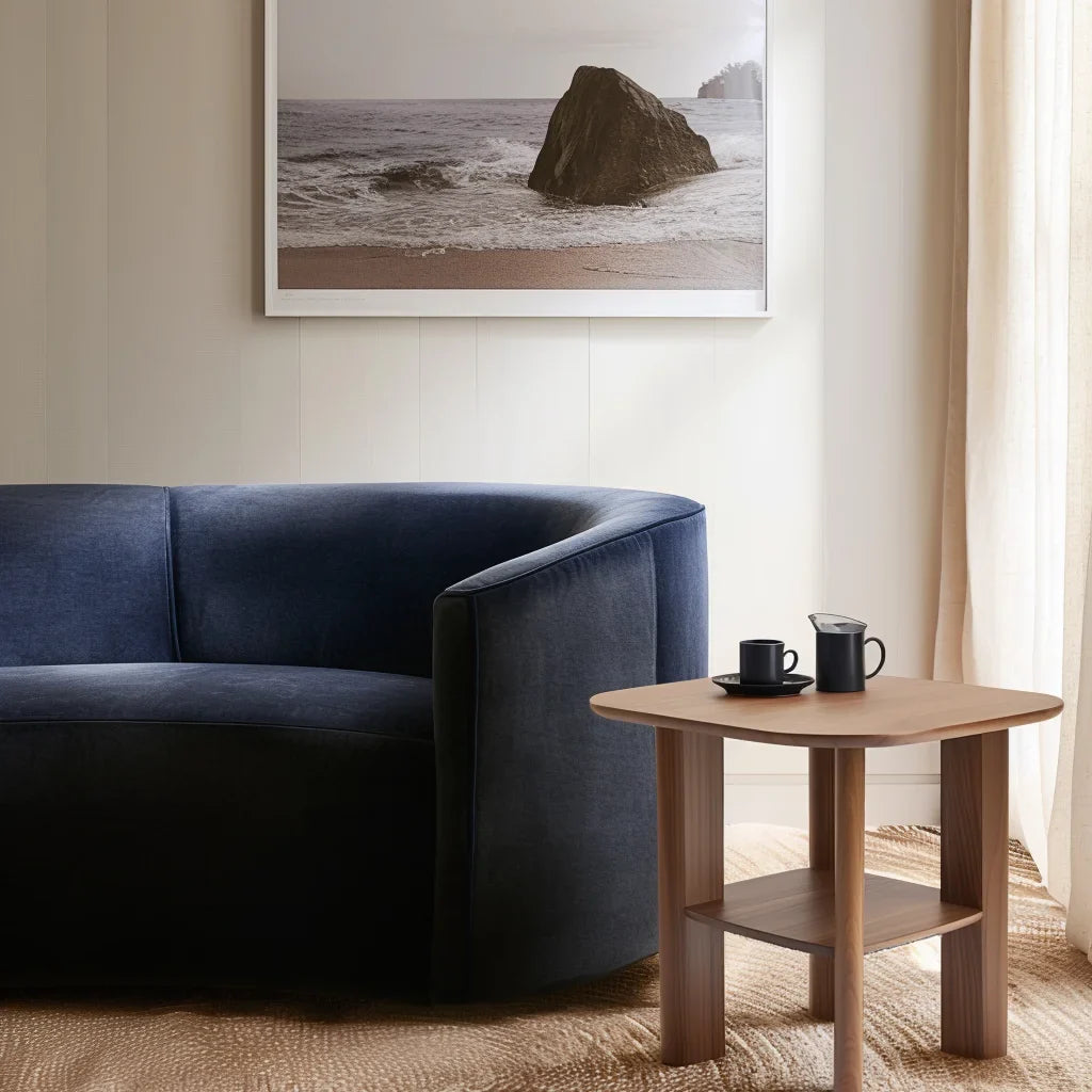 Everyday side table with square top and lower shelf styled in a cozy modern reading corner