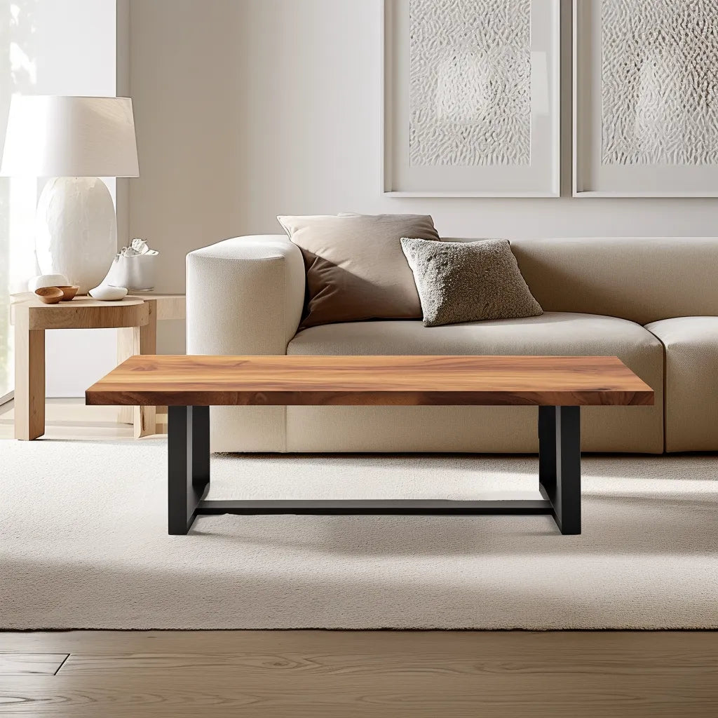 Industrial live edge coffee table with metal base and natural wood top.