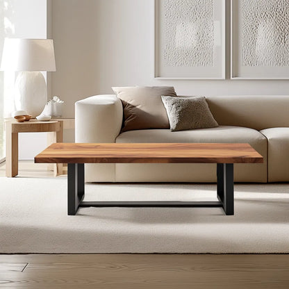 Industrial live edge coffee table with metal base and natural wood top.