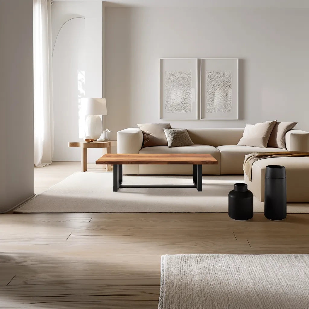 Industrial live edge coffee table with metal base and natural wood top.