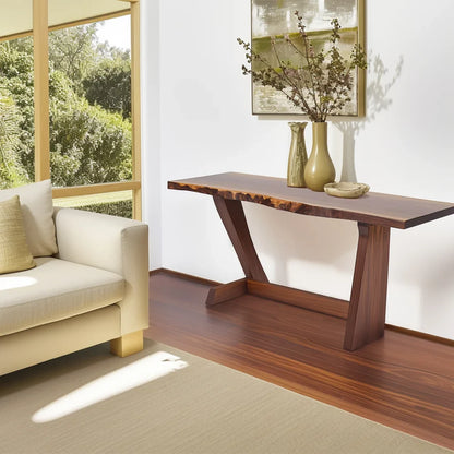 Live edge console table with angled legs styled in a sunlit modern living room