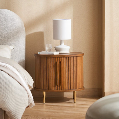 Luxury round nightstand with fluted panel design and gold metal legs perfect for modern bedrooms