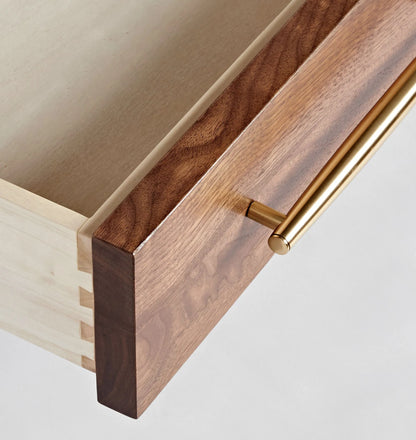 Mid century nightstand with single drawer, open shelf, and tapered legs.