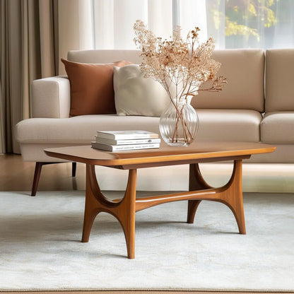 Midline coffee console centered in minimal lounge setting under warm filtered light