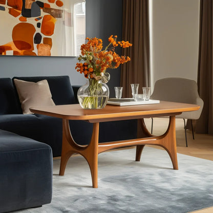 Midline coffee console centered in minimal lounge setting under warm filtered light