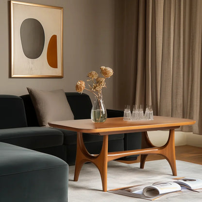 Midline coffee console centered in minimal lounge setting under warm filtered light