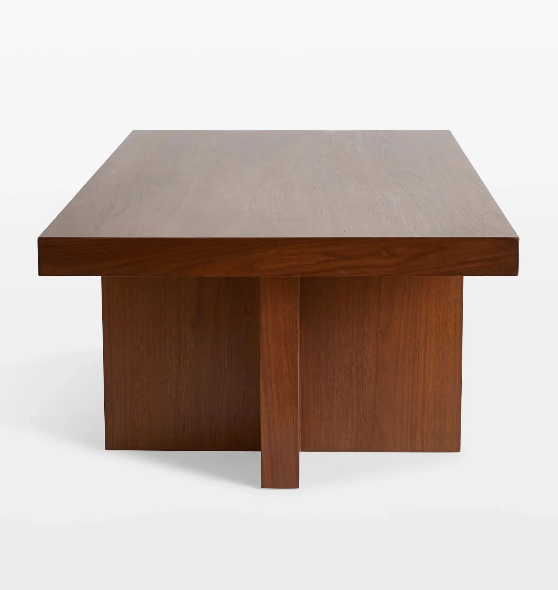 Minimalist coffee table featuring bold geometric design and smooth surface.