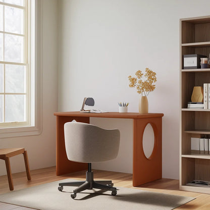 Minimalist study desk with open sculptural base in bright contemporary home office