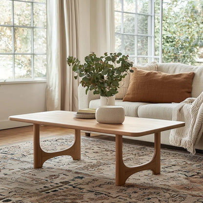 Modern Curved Coffee Table with natural wood finish and organic design