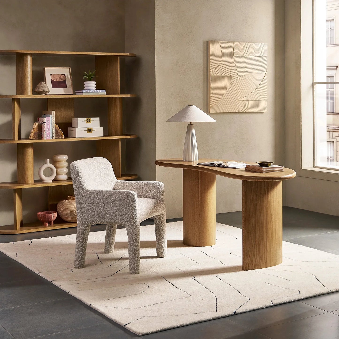 Modern Kidney Shaped Desk with a sculptural base and curved top perfect for contemporary workspaces