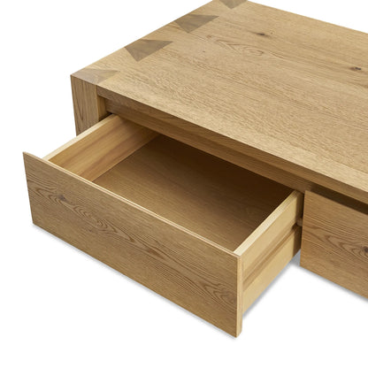 Stylish modern living room table with a spacious surface and hidden storage drawers for a clutter free space.