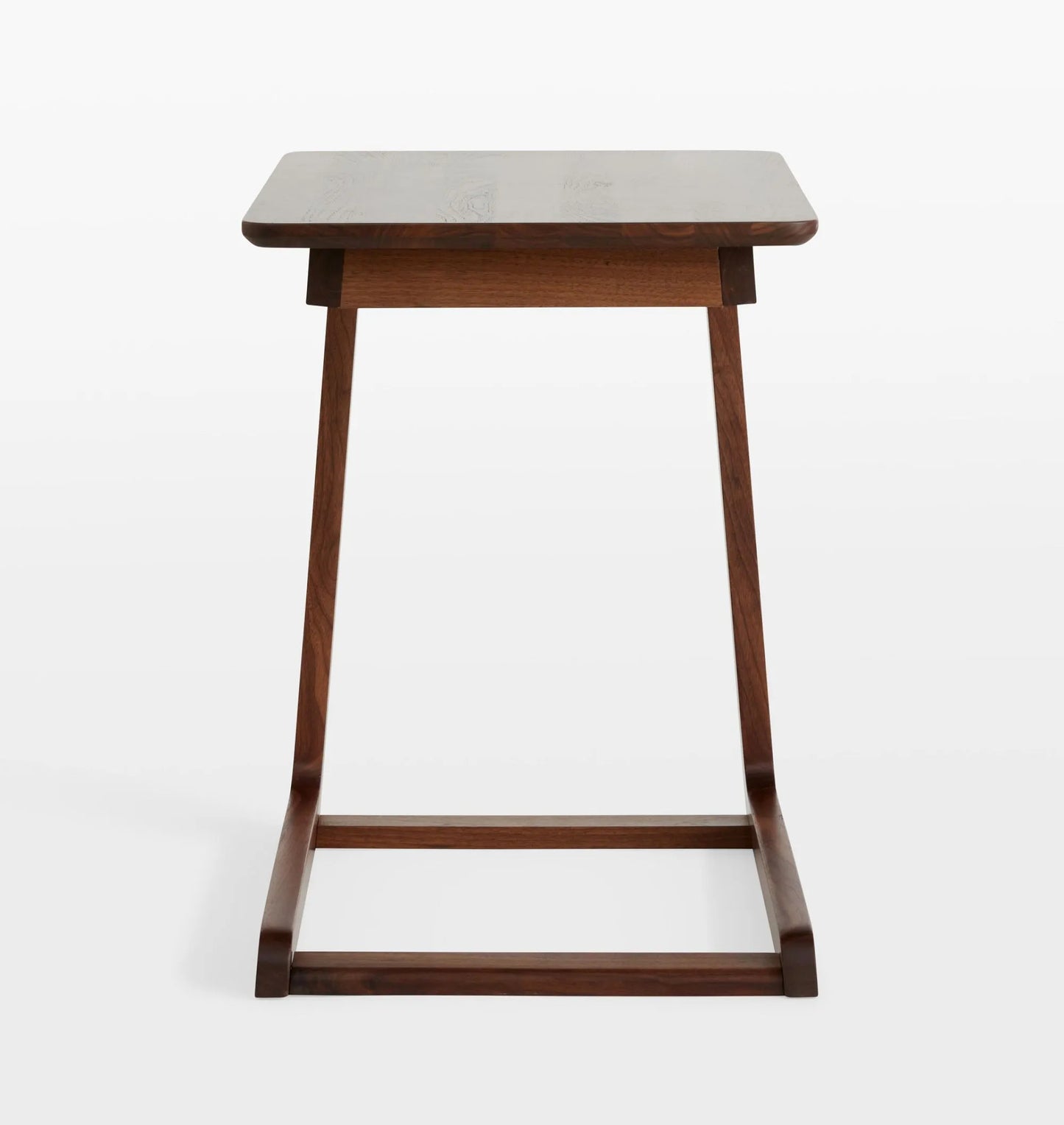 C Side Table with innovative C-shaped design and smooth finish.